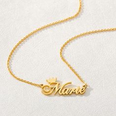 Lets make our lives more beautiful with custom/personalized items. This can bring you a lot of joy when you see your name or your loved once name on the item. Hi Having your personal touch on a piece of jewelry really makes a difference. Item:-   Crown Name NecklaceMetal:- Stainless SteelFinished:- Platinum-Rose Gold-GoldNecklace Size:-  43-45-50-55 CM Please Explain your Name On Personalization Box.Like This-   Abdul   Processing and shipping: 2-3 weeks is processing times and once shipped it t Minimalist Custom Name Charm Necklace, Minimalist Personalized Letter Charm Necklace, Dainty Customized Name Necklace For Personalized Gift, Minimalist Name Charm Necklaces For Personalized Gift, Minimalist Name Charm Necklace For Personalized Gift, Dainty Customizable Nameplate Necklace, Customizable Nameplate Charm Necklaces For Personalized Gift, Minimalist Customizable Charm Necklaces For Personalized Gifts, Minimalist Charm Necklace For Personalized Gift