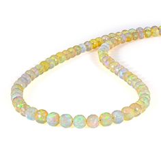 Ethiopian opal Shape- Round Faceted Size- 3.5-5.5 mm Length- 45 cm Metal- Sterling Silver 925 Ethiopian opal necklace-Round Faceted opal beads necklace-AAA Welo fire opal necklace-Beaded fire opal necklace -Natural Opal beads necklace All of my jewelry is designed and handcrafted by me. I love to experiment with many different designs and although I may make similar designs more than once, each piece of jewelry is truly one of a kind due to variations between gemstones and within my own craft wo Yellow Gold Ethiopian Opal Round Necklace, Handmade Oval Ethiopian Opal Necklace, Opal Choker, Ethiopian Opal Round Beads Jewelry For Gifts, Black Diamond Bracelet, Watermelon Tourmaline Necklace, Ethiopian Opal Necklace, Silver Multi-stone Ethiopian Opal Jewelry, Fire Opal Necklace