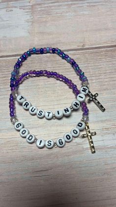 Trust In Him/ God is Good bracelets with cross charm Cross Bracelet Diy, Christian Friendship Bracelets, Blessing Bracelets, Rosary Making, Jewelry Booth, Bible Verse Bracelet, Girly Bracelets, Christian Journal, Blessing Bracelet