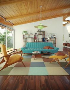 a living room filled with furniture and lots of wood on top of hard wood flooring