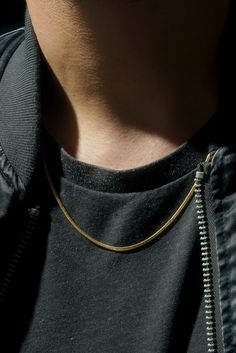 From our Dark Matter line - a sleek, flat chain. Outfitted with a sleek tag-style logo tag. Comes in gold, silver, and matte black, in lengths 18", 20", 22", and 26". Fits all our pendants. Waterproof, but not recommend for daily shower wear due to abrasive contact with loofahs and interaction with chemicals we can't account for. Matte black coating will scratch over time to reveal the underlying 316L steel. We love the look, though, and think it brings a certain wear and aged effect to the chai Ring Jewellery Design, Dress Book, Gold Chain Design, Indian Jewellery Design Earrings, Blackened Steel, Mens Bracelet Silver, Indian Jewellery Design, Jewelry Design Earrings, Stylish Dress Book