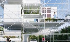 two people are walking down the street in front of a building that has glass walls