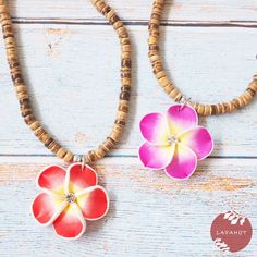 Colorful plumeria flower adorned with a twinkle gem in the center. Hand strung through a beaded necklace of wooden beads. Cute island charm all in a playful necklace. Wooden beads Hand formed plumeria flower Barrel fastener Hand-made, each unique Pendant: ~ 1 1/2" Length: ~ 17" Hawaiian Necklace, Red Pendant, Pink Pendant, Red Pendants, Unique Pendant, Wooden Beads, Twinkle Twinkle, Beaded Necklace, Gems