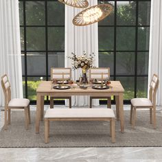 a dining table with four chairs and a bench in front of a large glass window