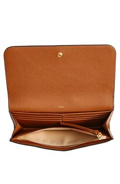 The iconic topstitching and tassel accent linked to the Marcie line distinguish this '70s-inspired leather wallet with a well-organized interior. Snap-flap closure Dual interior compartments with center zip-pocket divider; currency pockets; 12 card slots Leather Made in Italy Designer Handbags This brand has B Corp certification, representing business practices with emphasis on social and environmental performance, accountability and transparency This brand meets Nordstrom Responsible Brands cri Chloe Marcie, 70s Inspired, Designer Handbags, Long Wallet, Leather Wallet, Chloe, Zip Pockets, Nordstrom, Wallet