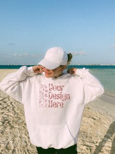 This Gildan 18500 white hoodie mockup shows a female model on beach in Mexico! Model is wearing an oversize hoodie for a trendy look. The VSCO aesthetic and film vibes are perfect for summer - so your designs stand out. (Gildan 18500 mockup beach - see shop for more) - WHAT YOU GET FROM US - This product is a digital file. You'll receive a ready-to-use JPG without watermarks. - THE FINE PRINT - - You may use this photo for personal & commercial use - You may not resell this file - Image is owned White Cotton Hoodie With Crew Neck, White Cotton Crew Neck Hoodie, White Relaxed Fit Long Sleeve Hoodie, White Long Sleeve Relaxed Fit Hoodie, White Hoodie Sweatshirt With Letter Print, White Relaxed Fit Hooded Sweatshirt, White Crew Neck Hoodie With Ribbed Cuffs, Casual White Crew Neck Hoodie, White Crew Neck Sweatshirt With Drawstring Hood