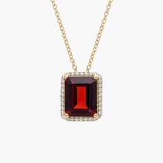 Embody elegance with this stately pendant necklace defined by a gorgeous emerald-cut garnet, surrounded by a shimmering halo. The rich tones of the stone are beautifully accented by the warm lustre of the 14k yellow gold. Garnet Pendant, Blue Nile, Emerald Cut, Precious Gemstones, Gemstone Necklace, Garnet, Emerald, Yellow Gold, Jewelry Necklaces