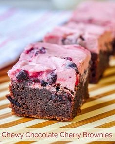 chocolate cherry brownies on a bamboo cutting board with the words chewy chocolate cherry brownies