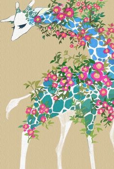 a giraffe with flowers on it's neck