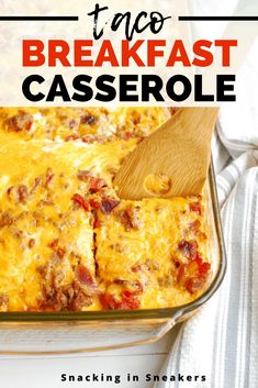 a casserole in a glass dish with a wooden spatula on the side