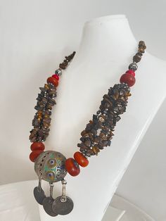 This necklace is a perfect gift for someone who truly loves and appreciates beautiful gemstones. I can only say that it is a beautiful piece of jewelry that will really make you stand out from the crowd. This necklace is made of huge beads. * Antique Moroccan Berber Necklace Handmade with coins, the necklace features an intricate pattern in its texture, a beautiful Berber piece of jewelry that radiates Moroccan Berber history and cultural significance, each handcrafted by artisans qualified from Spiritual One-of-a-kind Jewelry For Festivals, Unique Spiritual Jewelry For Festivals, Artisan Necklaces For Festivals, Handmade Necklaces For Rituals And Festivals, Bohemian Pendant Necklaces For Festivals, Bohemian Beaded Necklaces, Bohemian Pendant Jewelry For Rituals, Unique Festival Necklaces With Round Pendant, Festive Stone Necklaces For Gifts