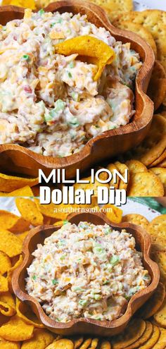 a wooden bowl filled with potato salad next to some crackers and chips on the side