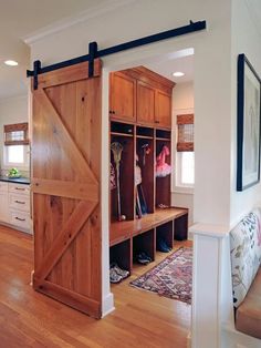 an open sliding barn door in a living room