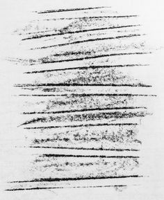 black and white photograph of lines drawn on paper