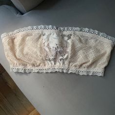 Size M Victoria’s Secret Bandeau- All Lace- Never Worn And Has Its Tag On. Stretch Strapless Tops With Lace Trim, Fitted Strapless Bra With Lace Trim, Lace Tube Top With Built-in Bra For Summer, White Lace Sleeveless Tube Top, Summer Bandeau Tube Top With Lace Trim, Feminine Stretch Bandeau Tube Top, Strapless Fitted Crop Top With Lace Trim, Fitted Strapless Crop Top With Lace Trim, Bandeau Lace Trim Tube Top For Summer