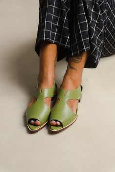 *This product is part of our archive sale. We do not accept returns for items on archive sale and purchases are final.* Flat leather sandals with a back zip closure in green. Unsure about your size? Please refer to our sizing page or send us a message using the chat button on our website. We will answer straight away. Silver Ballerina Flats, Flat Leather Sandals, Flat Leather Boots, Colored Sandals, Green Sandals, White Sandals Heels, Silver Pumps, Leather Sandals Flat, Wooden Heel