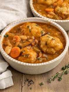 vegan dumpling stew in a bowl with carrots and potatoes