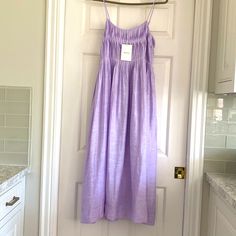 This Lovely Linen Summer Dress Is Brand New And Has Never Been Worn! All Tags Are Attached And It Is Ready To Ship And Wear! The Dress Drops To Below The Knee And Has A Flowy-Comfortable Feel! It Also Has A Simple Lining To The Knee, So You Do Not Have To Worry About The Dress Being ‘See Through!’ Linen Is Always A Perfect Choice For Summer And For Comfort- Dress Me Up With Heels Or Bring Me To The Beach Club For Apres Swim! This Item ‘Resides’ In A Smoke Free And Pet Free Home Lavender Sleeveless Midi Dress For Spring, Lavender Sundress For Vacation, Lavender Sleeveless Midi Dress For Brunch, Sleeveless Lavender Midi Dress For Brunch, Summer Lavender Midi Dress For Day Out, Spring Lavender Maxi Dress For Day Out, Lavender Sleeveless Maxi Dress For Summer, Lavender Maxi Dress For Spring Vacation, Summer Purple Maxi Dress For Daywear