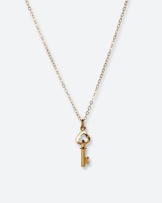 Meet Carolina, your next jewelry obsession. Its vintage key pendant is perfect for layering or wearing it by itself. MATERIALS & SIZE Material: 18k gold filled chain and 18k gold plated pedant Size: 16 in. chain Extender: 2 in. JEWELRY CARE Most of our jewelry is tarnish resistant, hypoallergenic, safe for sensitive skin. Handmade with ♡ in New York. - To maintain the beauty of your jewelry, whether it’s stainless steel, gold plated, or gold-filled, always avoid saltwater, chlorine (swimming poo Gold Key Pendant Jewelry, Gold Pendant Jewelry With Keys, Vintage Gold Necklaces With Keys, Vintage Gold Key Necklace, Vintage Gold Jewelry With Keys, Vintage Key Necklace, Key Necklace Vintage, Vintage Key, Vintage Keys