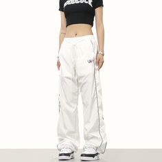 5ft 4''(163cm) tall, 97 lbs(44kg) weight and wearing a size M - Wide straight fit- Striped- Track style- 2 colors Sportswear High Waist Pants For Streetwear, Sportswear High-waist Pants For Streetwear, White High Waist Cargo Pants For Streetwear, Streetwear Wide Leg White Cargo Pants, High Waist White Cargo Pants For Streetwear, White High Waist Pants For Streetwear, High Waist White Pants For Streetwear, White Wide Leg Cargo Pants For Streetwear, White Baggy Full-length Sweatpants