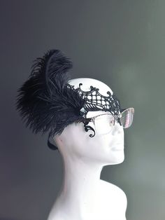 Made for eye glass wearers! Mask will fit around the frames of your eyeglasses comfortably.   Black lace masquerade mask with lovely feather clip attached. More colors for the feathers are available. S H I P P I N G  -   Last minute masquerade mask shopping? Quick processing available.  For 1-2 day guaranteed delivery, add items to cart, click on shipping tab for rates on last page of checkout. Msg us for delivery time frames (Include your state/country). S I Z E  Adult Size. Detailed dimensions Mask With Glasses, Lace Masquerade Masks, Thank You Wishes, Feather Mask, Female Mask, Lace Accessories, Lace Mask, Eye Glass, Masks Masquerade