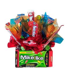 a box filled with assorted candy and lollipops