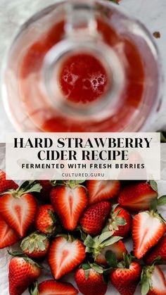 strawberries and strawberry juice in a glass with the words hard strawberry cider recipe