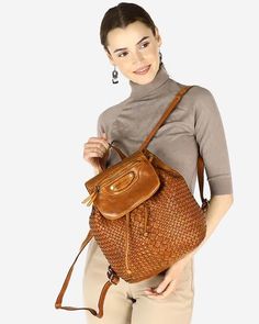 Leather Vintage Style Women's Backpack! Are you looking for an elegant and durable urban backpack? Check out our women's leather backpack, handcrafted from natural leather. This elegant backpack is a perfect solution for every woman who values quality and durability over the years. The backpack made from handwoven leather is a true gem among urban accessories. Its universal design makes it an ideal addition to both casual and formal outfits. The backpack features a spacious main compartment clos Casual Brown Leather Backpack For Daily Use, Casual Brown Soft Leather Backpack, Casual Brown Leather Backpack With Leather Lining, Casual Brown Leather Backpack, Casual Brown Leather Backpack For Everyday, Casual Brown Backpack With Leather Lining, Casual Brown Backpack With Leather Handles, Urban Accessories, Elegant Backpack