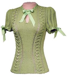 a women's green top with bows on the front and back, made out of knitted fabric