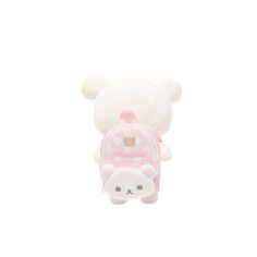 a white teddy bear with a pink backpack