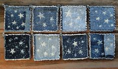 six pieces of blue and white fabric with stars on them, sitting next to each other