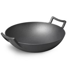 an empty frying pan on a white background