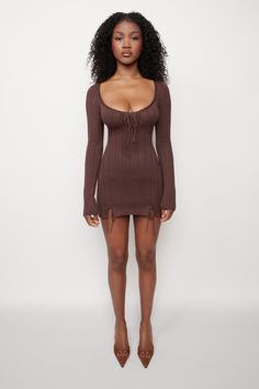 This is the only mini dress you need – meet our Dainty Long-Sleeve Knit Dress. Designed with all-over ribbing to hug the body with a fitted shape, it has an ultra-flattering deep scoop neckline and cutie ties and the neck and hem. The lacy edge and cut-out button-back provide the perfect finishing touch. Scoopneck with Best Dress Websites, Dress Quilt Pattern, Knit Dress Pattern, Pink Homecoming Dress, Long Sleeve Knit Dress, Dress Shoes Womens, Girls Party Dress, Knit Mini Dress, Brown Dress