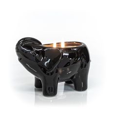 Thompson-Ferrier-Black-Elephant-Candle Nyc Office, Elephant Candle, Macintosh Apple, Rose Scented Candle, Black Elephant, Ceramic Elephant, Room Fragrances, Bitter Orange, Red Fruit