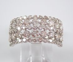 a white gold ring with diamonds on it