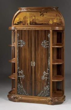 a wooden cabinet with glass doors on the front and side shelves in the middle, sitting against a gray background