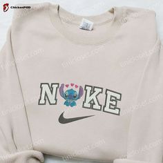 Introducing the Stitch Hearts x Nike Embroidered Sweatshirt, a perfect blend of style and comfort. Crafted with meticulous attention to detail, this sweatshirt features intricate embroidery of beloved Disney characters, adding a touch of whimsy to your wardrobe. Designed with a cozy hood, this Disney Characters Embroidered Hoodie envelops you in warmth on chilly winter [...] Nike Cartoon, Nike Inspired, Nike Clothes, Best Family Gifts, Maroon Hoodie, Cute Nike Outfits, Cute Nike, Custom Nikes, Nike Sweatshirts