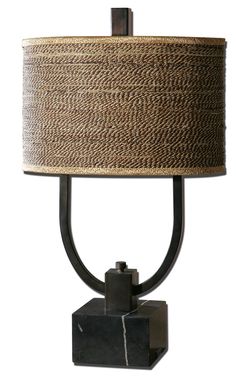 a table lamp with a black base and a brown shade on the top of it