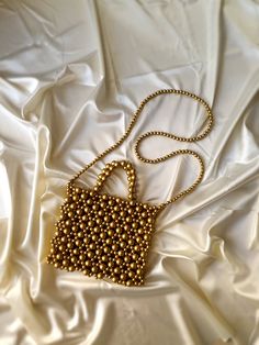 Gold Beaded Bag, Beaded Handbag Shoulder Bag, Gold Purse, Gold Evening Bag, Beaded Bag, Gift For Her, Beaded Purse, Special Order Bag, Custom Bag In this shop, I produce stylish and timeless bags with my imagination. My bags are the combination of natural materials and handcraft. I design useful and different models with love. I can improve myself with your ideas and suggestions and produce bags according to your wishes. Let's design together! * Details Handmade item Produce in just 1 day Proper Gold Beaded Shoulder Bag As Gift, Gold Beaded Shoulder Bag Gift, Gold Beaded Shoulder Bag For Gift, Gold Beaded Pouch Shoulder Bag, Gold Beaded Pouch Bag, Handmade Gold Square Shoulder Bag, Rectangular Evening Bags With Gold Beads, Handmade Gold Shoulder Evening Bag, Party Rectangular Bag With Gold Beads