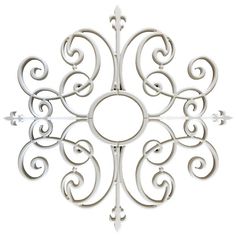 an ornate metal wall decoration on a white background