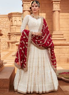 Show up in style with an Off White Anarkali with Maroon Dupatta featuring a georgette anarkali with santoon inner, santoon bottom & embroidered dupatta. Long Anarkali Set With Intricate Embroidery For Festivals, Maxi Length Georgette Churidar With Intricate Embroidery, Traditional Chikankari Embroidery Lehenga Maxi, Embroidered Georgette Maxi Length Dupatta, Embroidered Maxi Length Georgette Dupatta, Anarkali Set With Intricate Embroidery In Georgette, Anarkali Semi-stitched Churidar With Intricate Embroidery, Long Georgette Anarkali Set For Eid, Semi-stitched Anarkali Churidar With Intricate Embroidery