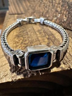 Enhance your bohemian style with our handcrafted Boho Woven Sapphire Blue Crystal Bracelet. The intricate weaving of sapphire blue crystals creates a unique and eye-catching accessory. Measuring at 7.1CM, this bracelet is perfect for adding a touch of elegance to any outfit. Size 18Cm=7.1inches, Sterling Silver Plated Blue Metal Spiritual Bracelets, Spiritual Blue Metal Bracelets, Bohemian Blue Gemstone Bracelets, Blue Bohemian Metal Bracelets, Blue Bohemian Gemstone Bracelets, Bohemian Blue Metal Bracelets, Bohemian Blue Crystal Bracelet For Gift, Blue Bohemian Crystal Bracelet For Gift, Bohemian Blue Crystal Bracelet Gift