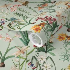 a wallpaper with flowers and leaves on it