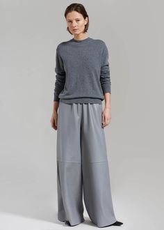 Color: Grey Midweight smooth leather Relaxed fit Wide leg Elasticated waistband Side seam hip pockets Slip-on style Unlined 100% Lamb Skin Dry Clean By The Frankie Shop. Made in India Wide Leather Pants, The Frankie Shop, Frankie Shop, Grey Knit Sweater, Clothes Shop, Grey Sweater, Smooth Leather, Latest Fashion Trends, Knit Sweater