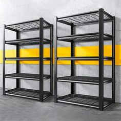 two metal shelvings with yellow dividers in an empty room