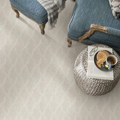 a living room scene with focus on the carpet