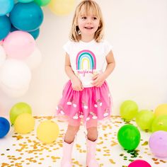 The Magical Rainbow Tutu for kids is fun skirt to celebrate being magical! Wear for that special celebration, or every day for a magical touch! Customers love Sweet Wink tutus because the tulle is super soft and doesn't scratch or itch little ones. Another great feature of Sweet Wink tutus is that the embellishments on the tutus don't "shed." You'll never have to worry about glitter trailing all over your house!Item Description:-Pink tulle embellished with multi-color sequins-Pink cotton lining- Playful Rainbow Tutu Dress For Spring, Rainbow Playful Tutu Dress For Dress-up, Playful Rainbow Tutu Dress For Dress-up, Playful Rainbow Tulle Tutu Dress, Rainbow Tutu Dress For Birthday In Spring, Gold Tutu, Pink Tulle Skirt, Multicolor Sequins, Rainbow Tutu