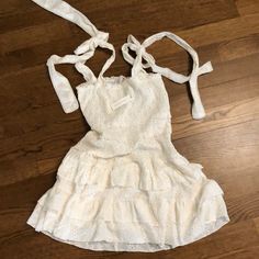 Off White Dress With Smocked Top And Eyelet Pattern. New With Tags, Perfect Condition, Never Worn Before. Beautiful Summer Dress. Self Adjustable Ties. Off White Dress, Beautiful Summer Dresses, Off White Dresses, Smocked Top, Eyelet Dress, Beautiful Summer, White Cream, Cream White, Summer Dress