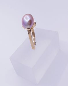 DEN1902 One of a kind baroque pearl 14k yellow gold ring. We found a dealer once with a most remarkable inventory. She had everything, matched strands, golden, Tahitian black, Akoya and a small ziplock bag containing a handful of these wonderful mauve baroque freshwater pearls. Each one was unique, the off-round qualities and the lovely depth of nacre suggesting such beautiful possibilities. This ring is the first of a line of designs using this treasure trove of special pearls. The idea in this Ziplock Bag, Ziplock Bags, Yellow Gold Ring, Baroque Pearls, Yellow Gold Rings, Ring Designs, Gold Ring, Freshwater Pearls, Statement Rings