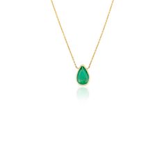 This exquisite necklace features a pear-cut emerald teardrop, elegantly suspended from a delicate chain. The vibrant green gemstone is carefully faceted to catch the light, creating a stunning focal point. Perfect for adding a touch of elegance to any outfit, this necklace embodies timeless beauty and refined sophistication. Emerald enhances the intellectual capacity. Designed with a pear cut emerald set in bezel settings making a chain of the necklace to make you stand out of the crowd. This is a perfect Grandma Gift, Bridal Shower Gift, Mom Gift, Gift For Sister, Mother Daughter Gift, Bride To Be Gift, Bridesmaid Gift, Anniversary Gift, Friendsgiving Gift, Engagement Gift, Wedding Gift, Mother's Day Gift or any Holiday Gift for Mother, Sister, Daughter, Grandma, Fiancé, Girlfriend, Valen Luxury Pear-shaped Emerald Gemstone Necklace, Elegant Emerald Teardrop Pendant Necklace, Fine Jewelry Green Pear-shaped Necklaces, Fine Jewelry Green Pear-shaped Necklace, Elegant Emerald Teardrop Necklace, Elegant Pear-shaped Emerald Necklaces, Elegant Pear-shaped Emerald Necklace, Green Pear-shaped Fine Jewelry Necklaces, Elegant Green Pear-shaped Necklace